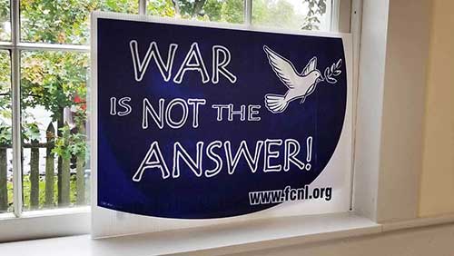 War is not the Answer sign in window